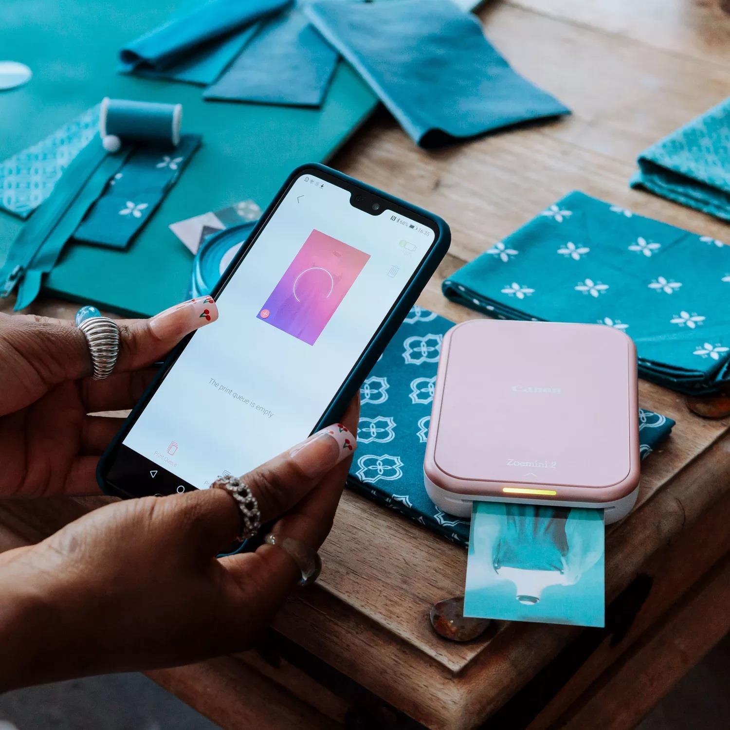 Canon Zoemini 2 - Drucker - Farbe - Zink - 50.8 x 76.2 mm - 313 x 500 dpi - bis zu 0.83 Min./Seite (einfarbig)/ bis zu 0.83 Min./Seite (Farbe) - Kapazität: 10 Blätter - Bluetooth 5.0 - pink (5452C003)