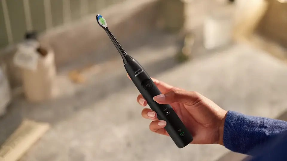Philips Electric Toothbrush HX7119/02, Oval Brush Head, Sonic Cleaning System