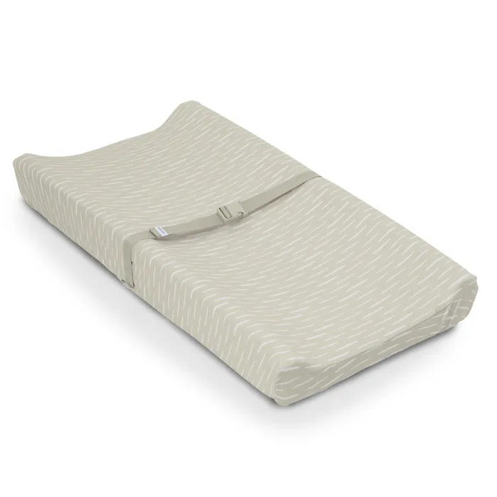 INGENUITY- Matelas à langer beige à contour réhaussé et harnais de sécurité, déhoussable